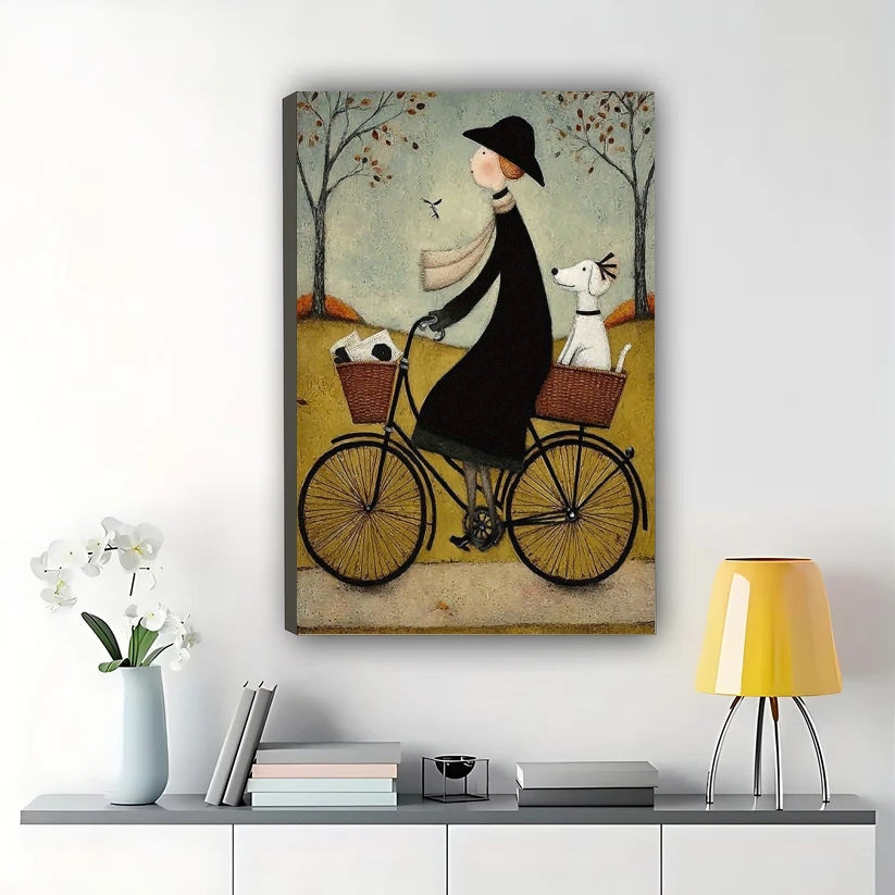 Woman Riding Bicycle with Dogs Wall Art – Whimsical Folk Art Style Canvas Print on Natural Wood Frame