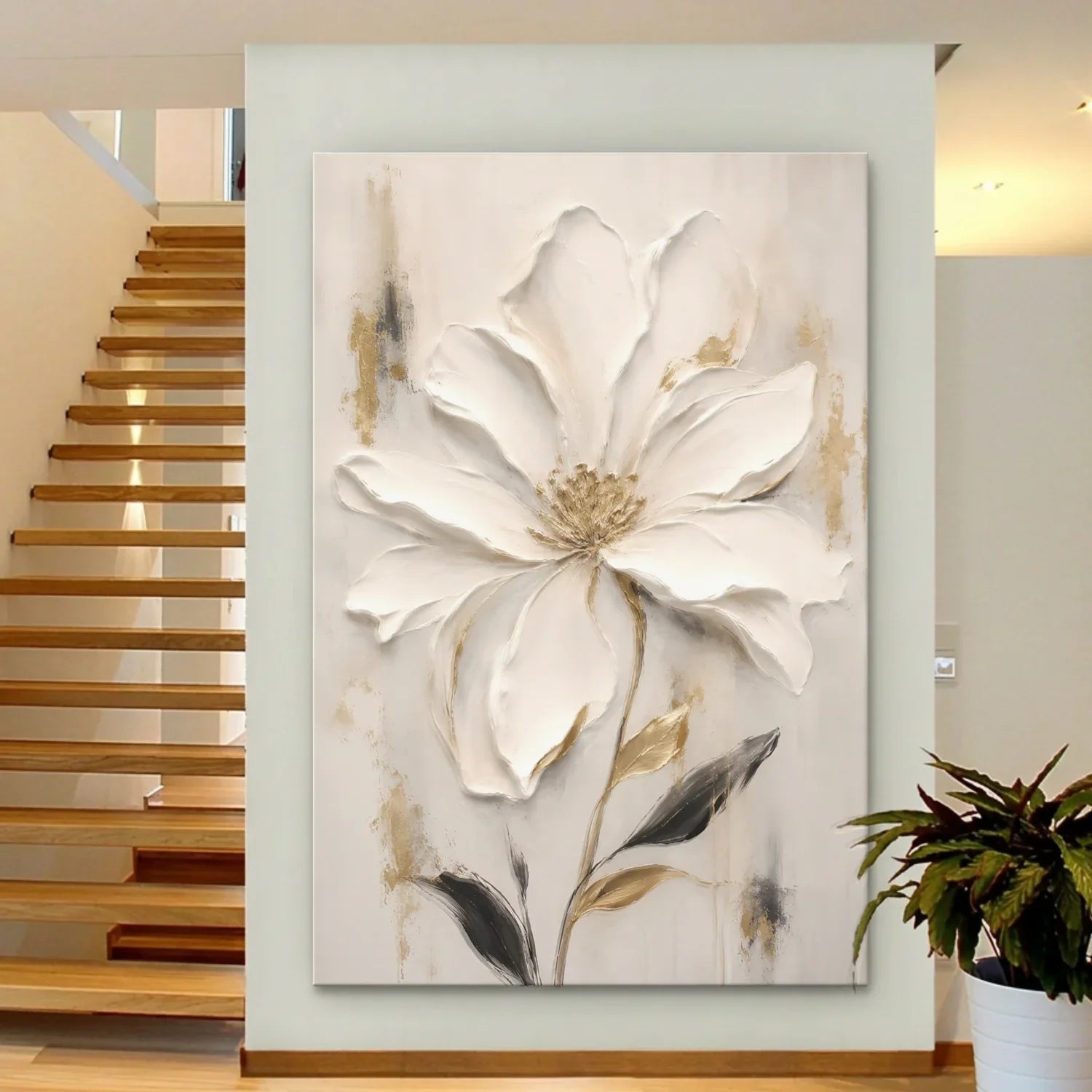 Decorative wall art of a large white flower in a modern interior setting with a staircase.