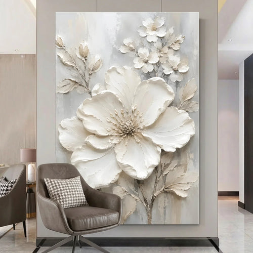Decorative wall art with large floral design in a modern living room.