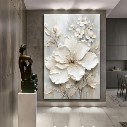 Decorative floral painting on a wall with a bronze sculpture in a modern interior setting.