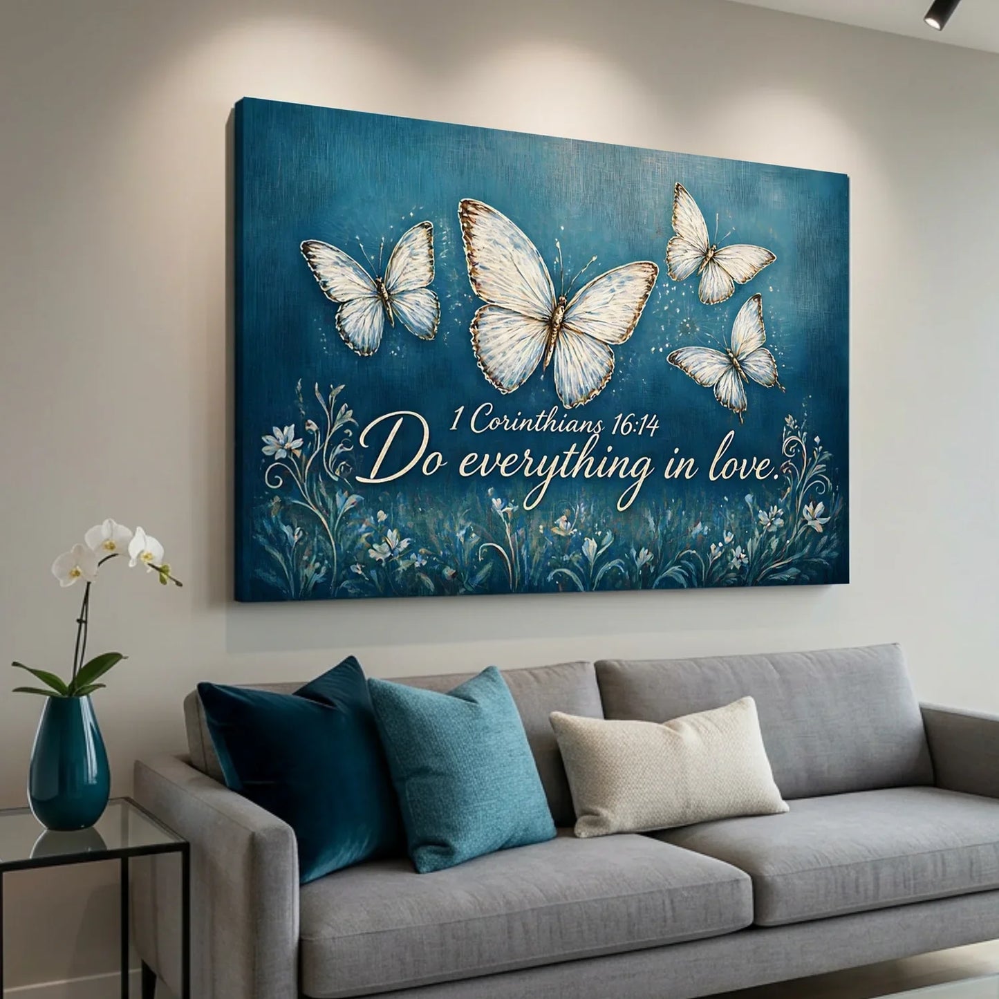 Decorative wall art with butterflies and a quote on a blue background in a living room.