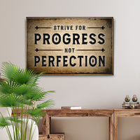 Strive For Progress Sign