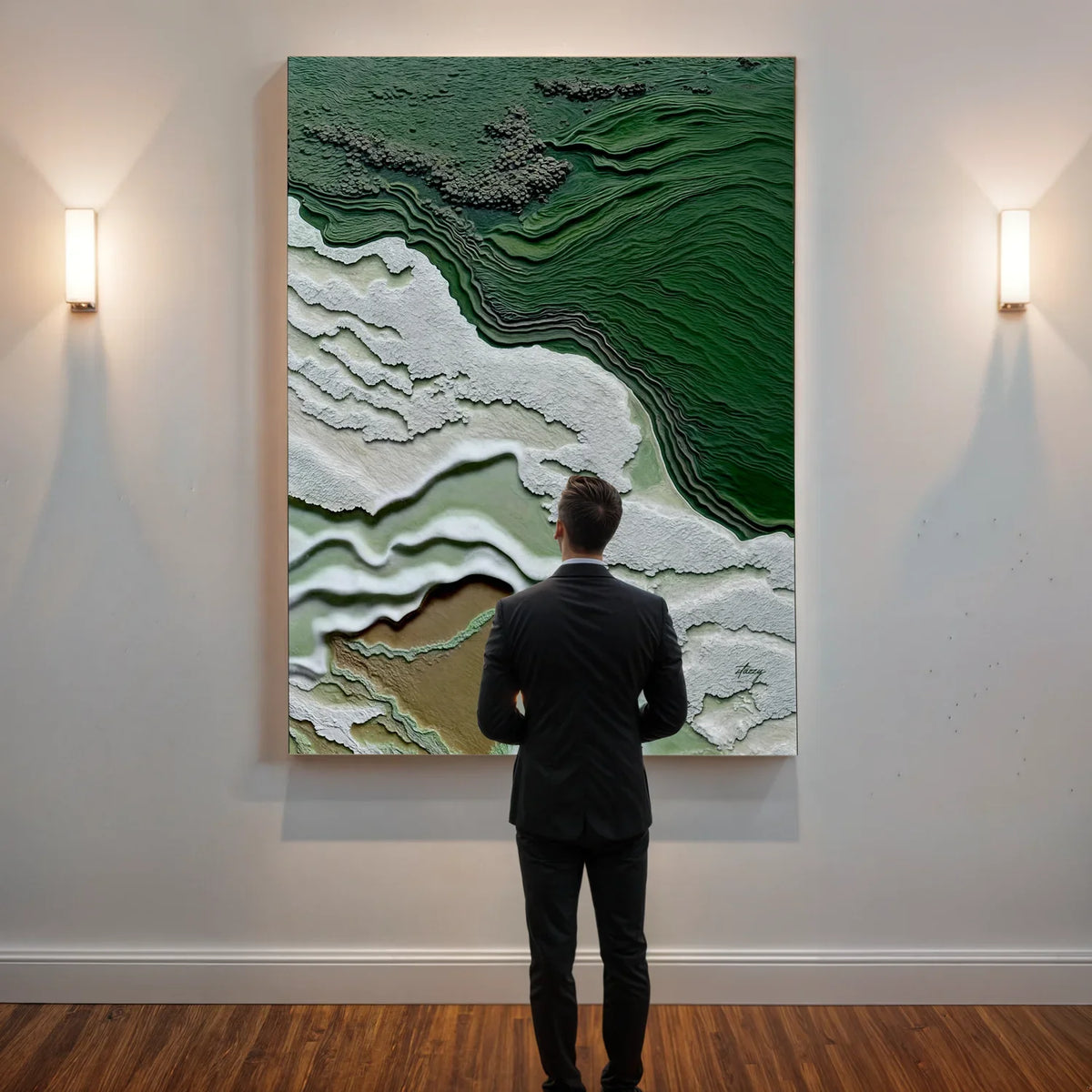 Man in a suit standing in front of a large abstract painting on a wall. Canvas Print: "Verdant Cliffs"