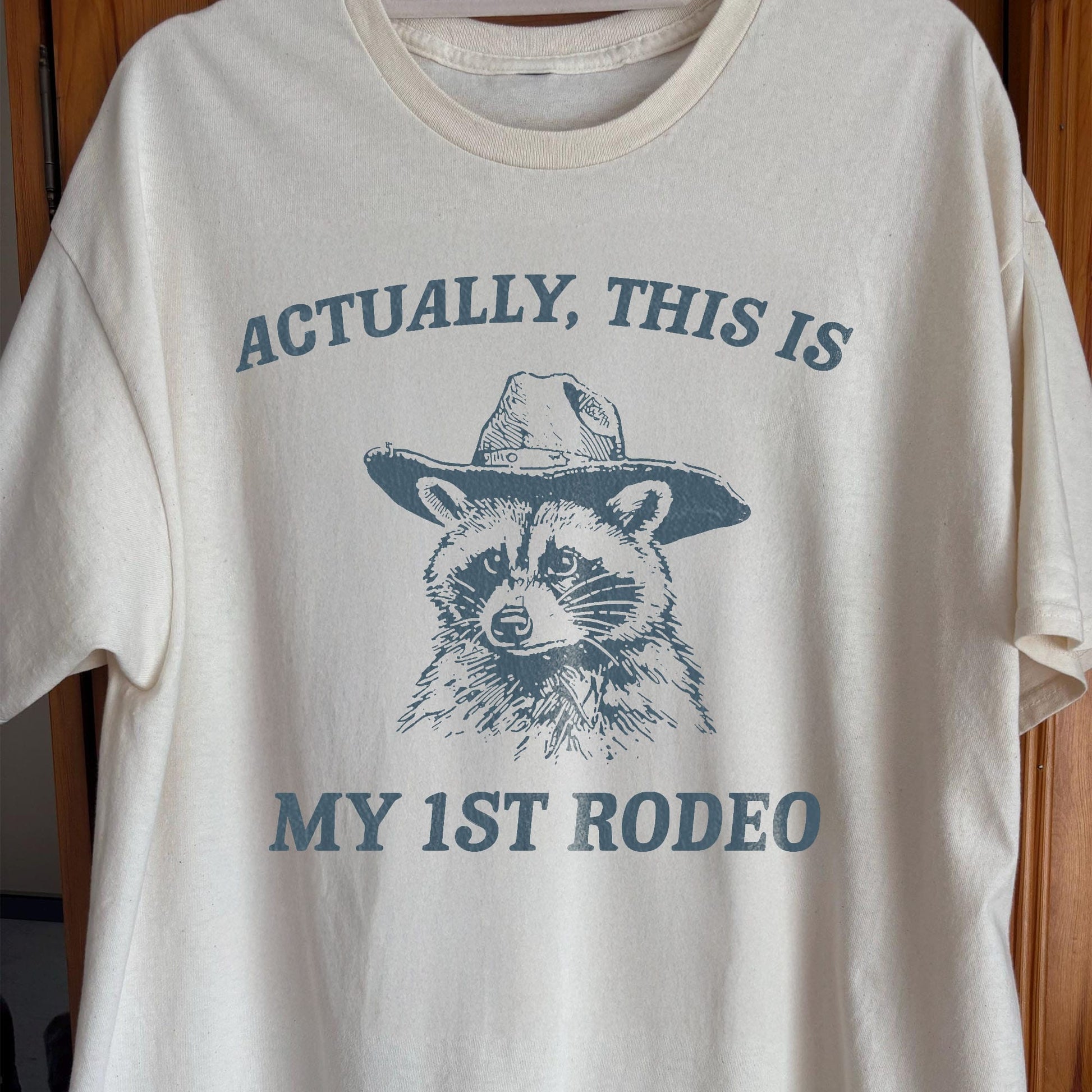 Funny Raccoon Cowboy Actually This Is My 1st Rodeo Shirt, funny meme tee gift